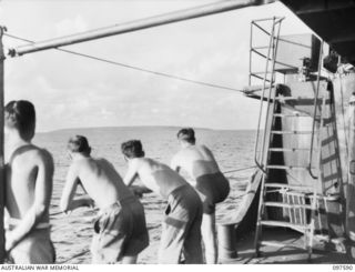 OCEAN ISLAND. 1945-09-30. THE FRIGATE HMAS DIAMANTINA ARRIVING TO TAKE THE SURRENDER OF JAPANESE TROOPS