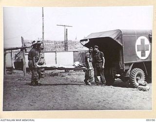 BOUGAINVILLE, 1945-06-18. PATIENTS FROM FORWARD AREAS BEING ADMITTED TO 109 CASUALTY CLEARING STATION, MOTUPENA POINT