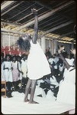 Girl in white dress on a platform