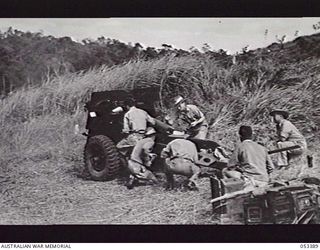 SOGERI VALLEY, NEW GUINEA. 1943-06-29. NO. 1 GUN OF B TROOP, 9TH BATTERY, 2/5TH AUSTRALIAN FIELD REGIMENT, AT GUNNERY PRACTICE