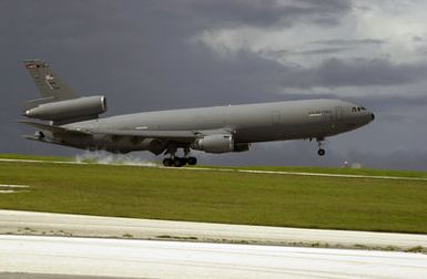 A US Air Force (USAF) KC-10A Extender cargo/tanker aircraft, 60th Air Mobility Wing (AMW), Travis Air Force Base (AFB), California (CA), touches down on the runway at Andersen AFB, Guam, delivering troops and equipment in support of Exercise COPE NORTH. COPE NORTH is an exercise in which US Air Force, US Marines, and the Japanese Air Self Defense Force (JASDF) participate in joint training