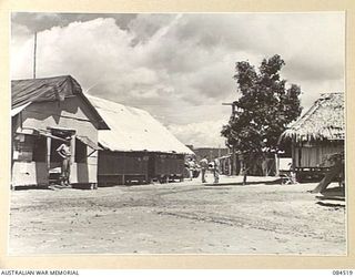 LABU, NEW GUINEA. 1944-12-18. THE CAMP AREA AT 55 PORT CRAFT COMPANY SHOWING THE ORDERLY ROOM AND OTHER ADMINISTRATIVE OFFICES