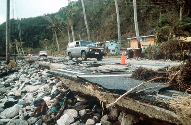 High ocean surf created by Cyclone Val damaged highways on the South Pacific island of American Samoa