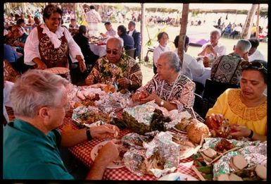 People eating a meal, Niue