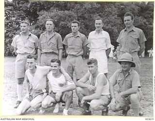 PORT MORESBY - AIR FORCE TUG-OF-WAR TEAM (WITH "MENTOR") AT A.A.C. MEETING. RAAF SURVEY FLIGHT. (NEGATIVE BY N. TRACY)