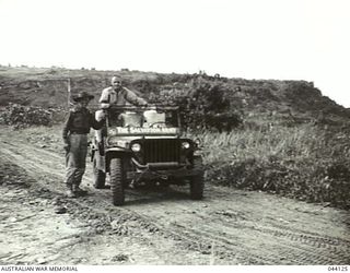 WEWAK AREA. NEW GUINEA. THE SALVATION ARMY JEEP USED TO PROVIDE REFRESHMENTS TO TROOPS DURING THE ATTACK ON WEWAK. DONATED BY MAJOR D.W. CHRISTIAN, SALVATION ARMY