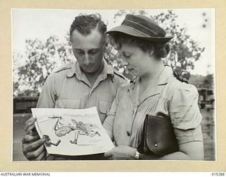 1943-07-26. NEW GUINEA. HUMOROUS AND TOPICAL SKETCHES DRAWN BY SGT. OWEN BOND OF STRATHFIELD, N.S.W. WERE AWARDED AS PRIZES AT A SPORTS MEETING ORGANISED BY AN AUSTRALIAN ARTILLERY UNIT IN NEW ..