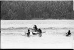 Canoeing in surf