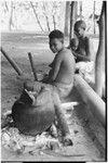 Ambaiat: women cook pig's head from pork distribution in clay pot