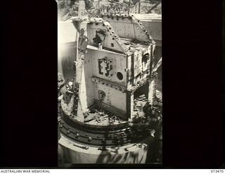 Port Moresby, New Guinea. 1944-07. No. 1 gun at Basilisk Battery, 801st Anti-Aircraft and Coast Artillery Battery, Headquarters Moresby Base Sub-Area, viewed during the course of its assembly. The ..