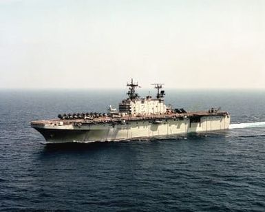 A port view of the amphibious assault ship USS SAIPAN (LHA 2) underway during the NATO Southern Region exercise DRAGON HAMMER '90