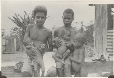 Twin boys suffering from malnutrition from Awala village after eruption, 1952 / Albert Speer