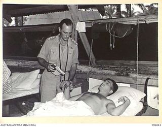 PALMALMAL, JACQUINOT BAY, NEW BRITAIN. 1945-09-08. AFTER THE JAPANESE SURRENDER, ALLIED PRISONERS, MOST OF THEM IN EMACIATED CONDITION, WERE PICKED UP AT RABAUL BY HMAS VENDETTA AND BROUGHT TO ..