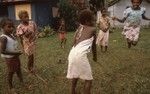Children in Lorlow playing jump vine