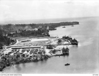 LANGEMAK BAY, NEW GUINEA. 1944-04-03. AN AERIAL PHOTOGRAPH INDICATING THE PORT DEVELOPMENT AND THE INCREASED MOVEMENT OF SUPPLIES THROUGH THE AREA