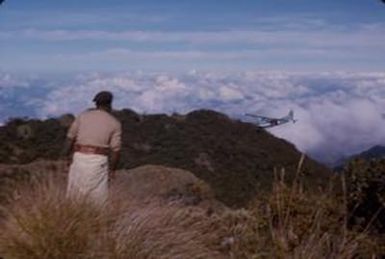 [Man amid landscape of Mount Piora in Papua New Guinea]