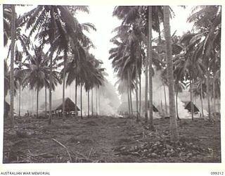 KOKOPO, NEW BRITAIN, 1945-11-23. A GENERAL VIEW OF THE BARRACKS AT THE FORMOSAN AND KOREAN PRISONER OF WAR CAMP. THE CAMP WAS CONSTUCTED UNDER THE SUPERVISION OF 13 FIELD COMPANY ROYAL AUSTRALIAN ..