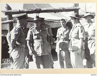 BOUGAINVILLE. 1945-06-09. GENERAL SIR THOMAS A. BLAMEY, COMMANDER-IN-CHIEF, ALLIED LAND FORCES, SOUTH WEST PACIFIC AREA (1), WITH AUSTRALIAN ARMY NURSING SERVICE MEMBERS OF THE STAFF DURING HIS ..