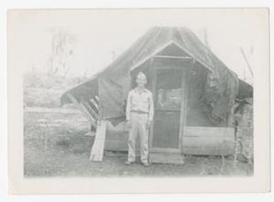 [Soldier Smiling Outside Tarp Covered Building, #1]