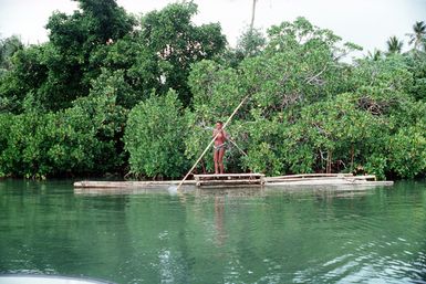 A Yapese villager fishes in a local river