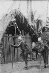 Two men in ceremonial dress, New Guinea, c1924 to ?