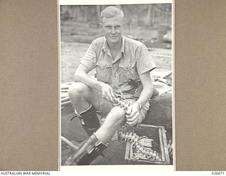 MILNE BAY, PAPUA. 1942-09. SERGEANT G.E. PAGAN, SERVING WITH 76 FIGHTER SQUADRON RAAF IN NEW GUINEA