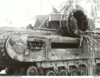 MADANG, NEW GUINEA. 1944-10-12. A CHURCHILL IV TANK WITH THE GUARDS AND MUD PLOUGH REMOVED DURING TESTS AT HQ 4 ARMOURED BRIGADE
