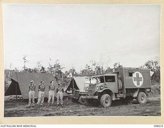 WEWAK, NEW GUINEA. 1945-10-26. A CEREMONIAL PARADE AND MARCH PAST BY 6 DIVISION WAS INSPECTED BY GENERAL SIR THOMAS A. BLAMEY, COMMANDER-IN-CHIEF, ALLIED LAND FORCES, SOUTH WEST PACIFIC AREA, AT ..