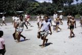 French Polynesia, school children exercising outdoors on Tahiti Island