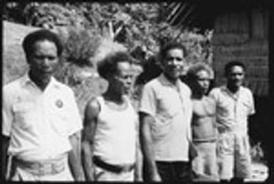 Group portrait of political figures, including former headman Meke 'Ooanigela, 'Maena'adi or Uru, Defete of Sinalagu, possibly Bui'a, and Jonathan Fifi'i