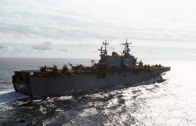 A starboard quarter view of the amphibious assault ship USS SAIPAN (LHA 2) underway during NATO Exercise NORTHERN WEDDING 86