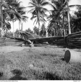 MILNE BAY, PNG, 1943-06. SPITFIRE AIRCRAFT OF NO. 79 SQUADRON RAAF IN DISPERSAL BAY AT NO 1 STRIP (GURNEY FIELD)