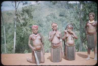 Highland girls in work-day dress are playing jews' harps : Wahgi Valley, Papua New Guinea, 1954-1955 / Terence and Margaret Spencer