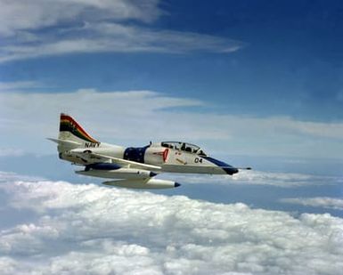 An air-to-air right side view of a Fleet Composite Squadron 1 (VC-1) TA-4J Skyhawk aircraft