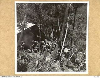 NEW GUINEA, 1943-07-27. 17TH AUSTRALIAN INFANTRY BRIGADE COOKHOUSE ON GAUDAGASAL RIDGE. LEFT TO RIGHT:- NX11638 SIGNALLER V. MCGREGOR; VX56929 PRIVATE (PTE) S. N. WALSH; VX55493 CORPORAL F. G. ..