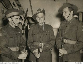 PROBABLY CAPE TOWN, SOUTH AFRICA, C. 1946-06. THREE VICTORIA CROSS WINNERS, PART OF HEADQUARTERS LONDON VICTORY MARCH CONTINGENT WHO LEFT SYDNEY ON HMAS SHROPSHIRE ON 1946-04-11 FOR LONDON. LEFT TO ..