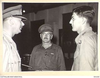 LAE AREA, NEW GUINEA, 1945-06-30. DURING HIS TOUR OF INSPECTION OF AUSTRALIAN TROOPS IN THE LAE AREA, HIS ROYAL HIGHNESS, THE DUKE OF GLOUCESTER, GOVERNOR-GENERAL OF AUSTRALIA, VISITED THE ..