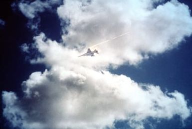 A left side view of an F-16 Fighting Falcon aircraft in flight during exercise COPE ELITE '81. The Falcon is from the 428th Tactical Fighter Squadron, 474th Tactical Fighter Wing