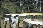 Tabibuga airstrip, people and small airplanes