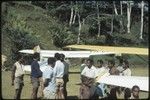 Tabibuga airstrip, people and small airplanes