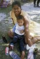 Federated States of Micronesia, woman and little boy relaxing in Chuuk State