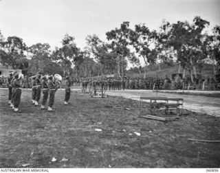 NEW GUINEA. 1943-11-20. GUARD PLATOON OF THE 18TH AUSTRALIAN INFANTRY BRIGADE MARCHING OFF THE AREA AFTER THE MARCH PAST FOR NX8 LIEUTENANT GENERAL SIR LESLIE MORSHEAD KCB KBE CMG DSO ED, GENERAL ..