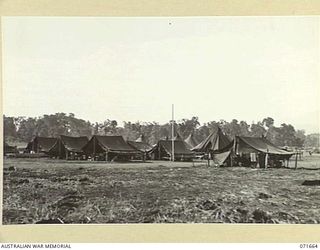 LAE, NEW GUINEA. 1944-03-24. THE TEMPORARY TENT LINES OF AN ADVANCE PARTY OF THE 2/7TH ADVANCED PARTY OF THE 2/7TH ADVANCED WORKSHOP, AUSTRALIAN ELECTRICAL AND MECHANICAL ENGINEERS