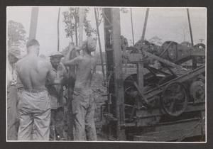[Group of Men at Well Drill]