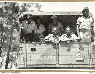 SOUTHPORT, QLD. 1944-01-18. NEW GUINEA POLICE BOYS PREPARING TO LEAVE THE 4TH ARMOURED BRIGADE CAMP FOR A TOUR OF THE BRISBANE AREA