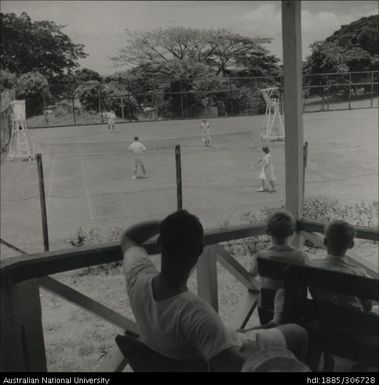 Playing tennis