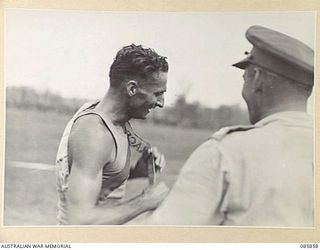 HERBERTON, QLD. 1945-01-19. GUNNER H W PENDLE, 2/7 FIELD REGIMENT, (1), WINNER OF THE 1 MILE RACE IN THE 9 DIVISION GYMKHANA AND RACE MEETING HELD AT HERBERTON RACECOURSE