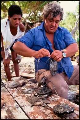 Man with chaplet of oyster shells, Manihiki, Cook Islands