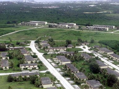 An aerial photograph of Marbo Annex on the island of Guam taken from a CH-53D Sea Stallion helicopter from HMH-463, Aviation Support Element, Kaneohe Bay Hawaii. Marbo Annex was used as a landing zone during Exercise KOA THUNDER 2001. Marines from Aviation Support Element, Kaneohe Hawaii, 1ST Marine Air Wing, Okinawa, Japan, and 3rd Marines 7th Battalion, 29 Palms, California, participated in KOA THUNDER on the island of Guam from July 9 to July 14. The purpose of the exercise was to demonstrate the Marine Corps' ability to deploy in the South Pacific from places other than Okinawa, Japan