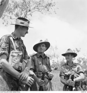 SOGERI, NEW GUINEA. 1943-11-04. NCO INSTRUCTORS OF THE JUNIOR LEADERS WING OF THE NEW GUINEA FORCE TRAINING SCHOOL. LEFT TO RIGHT: QX52354 SERGEANT (SGT) D. H. YOUNG; NX11590 SGT J. W. MORRIS; ..